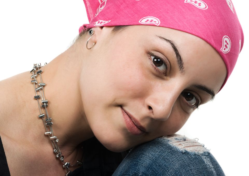 Face of a beautiful young female cancer survivor after cosmetic brows and eyeliner tattooing